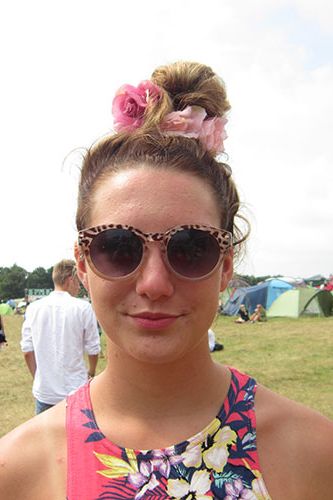 <p><strong>Lois, 17, Ipswich</strong></p>
<p>Lois was on to a good thing when she tied her hair back in a smooth top knot. Decorate it with some festival-essential flowers, and away she goes!</p>
<p><a href="http://www.cosmopolitan.co.uk/beauty-hair/news/trends/celebrity-beauty/festivals-2014-makeup-hair-celebrity-inspiration" target="_blank">CELEB FESTIVAL BEAUTY INSPIRATION</a></p>
<p><a href="http://www.cosmopolitan.co.uk/beauty-hair/beauty-tips/hair-how-to-quiff-with-bun" target="_blank">HAIR HOW TO: THE QUICK QUIFF BUN</a></p>
<p><a href="http://www.cosmopolitan.co.uk/beauty-hair/beauty-tips/hair-how-to-quiff-with-bun" target="_blank">IS HAND ART THE NEW NAIL ART?</a></p>
<p><em><span class="s1">Peugeot celebrated the launch of the </span>New Peugeot 108 this weekend at Latitude</em></p>