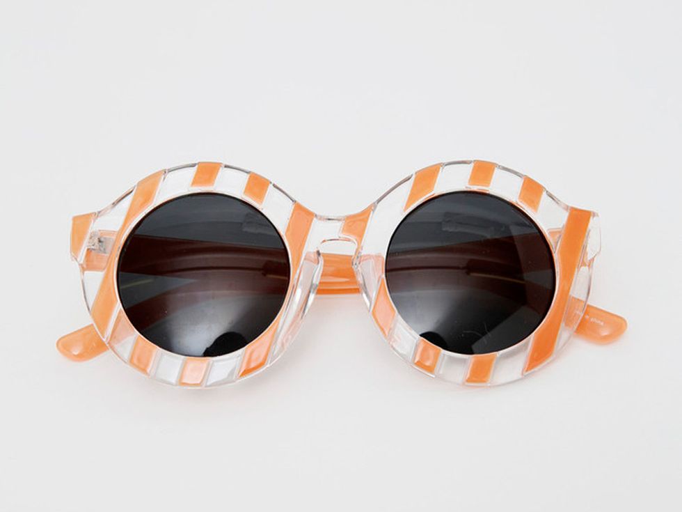 <p><strong>The Sunglasses</strong></p>
<p><a href="http://www.thewhitepepper.com/collections/eyewear/products/candy-stripe-sunglasses-coral" target="_blank">These oversized shades</a> are a clever yet quirky way to hide those bare lashes whilst round the pool; no one will know you're recovering from last night's cosmopolitans, Carrie Bradshaw-style.</p>
<p><a href="http://www.cosmopolitan.co.uk/fashion/shopping/best-heels-shoes-summer-2014" target="_blank">HOT TO TROT: SHOP SUMMER HEELS</a></p>
<p><a href="http://www.cosmopolitan.co.uk/fashion/shopping/best-mirrored-sunglasses" target="_blank">13 AMAZING MIRRORED SUNNIES</a></p>
<p><a href="http://www.cosmopolitan.co.uk/fashion/shopping/best-summer-swimwear" target="_blank">THE BEST ONE-PIECES TO BUY NOW</a></p>