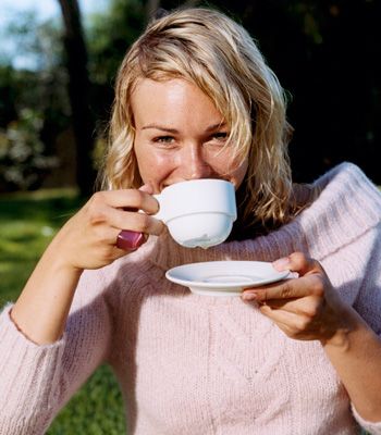 Finger, Cup, Beauty, Drinking, Dishware, Blond, Serveware, Sweater, Coffee cup, Nail, 