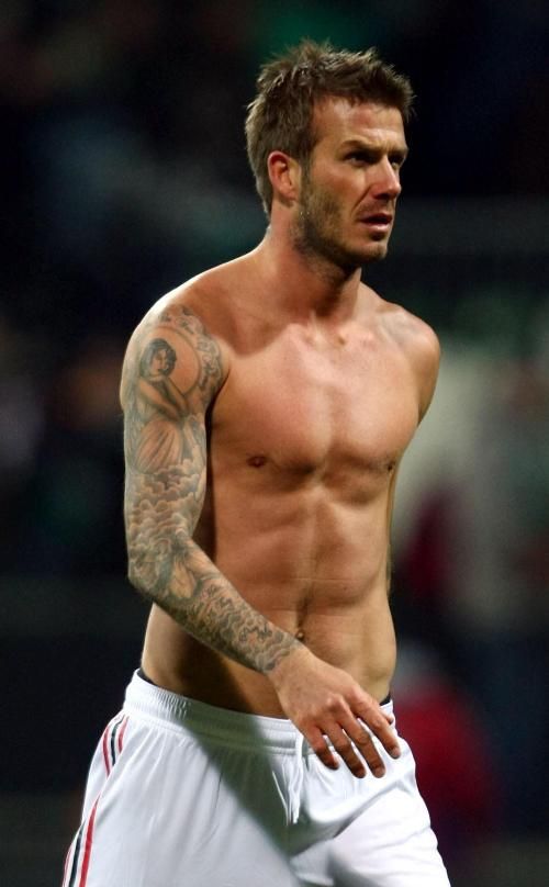 <p>Look at the football player with his top off</p>