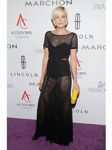 We almost had to double-take when we spotted Agness Deyn at ACE Awards! Agness made the sheer peek-a-boo trend live on by wearing this floor length frock. A very polished look for Agness Deyn - love it or loathe it?