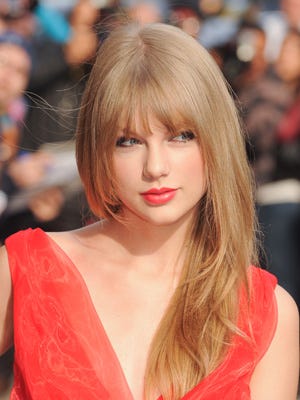 Taylor Swift full fringe hair style