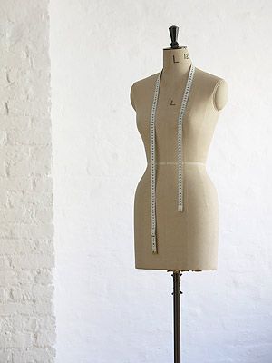 Collar, Mannequin, Personal protective equipment, Jewellery, One-piece garment, Fashion design, Pattern, Day dress, 