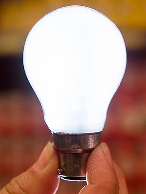 Finger, Nail, Thumb, Light bulb, Compact fluorescent lamp, Incandescent light bulb, Electrical supply, Fluorescent lamp, 