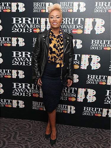 <p>Is there no end to Emeli Sandé's talents? Not only does she have an uh-mazing voice (jealous, us?) but she has great style too. The Next To Me singer looked quite the rock chic at the BRIT Awards nominations in London last night in a crow print shirt, black pencil skirt and leather biker jacket. She finished off her look with black courts, vampy nails and a huge grin from being nominated for four awards. Do you think Emeli rocked this outfit?</p>