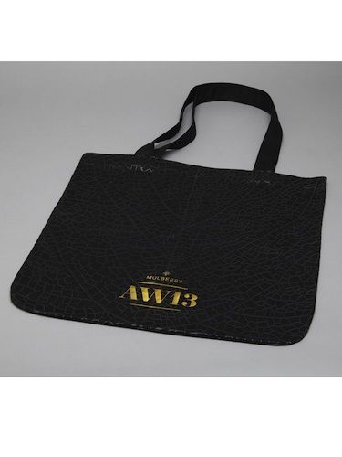 Product, Logo, Black, Bag, Shoulder bag, Label, Costume accessory, Brand, Tote bag, Shopping bag, 