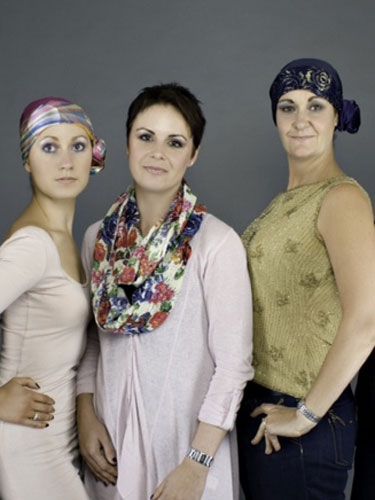 Ciara (centre) now designs headscarves for women with cancer