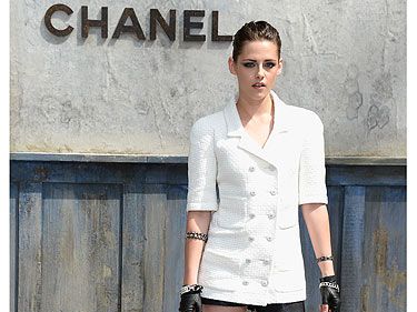Kristen Stewart steps out in leather fingerless gloves at Chanel couture  show in Paris