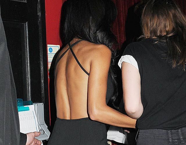 The back of Nicole Scherzinger's black backless dress