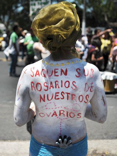 Members of feminist organisations demonstrate in favour of abortion outside the Courthouse of San Salvador