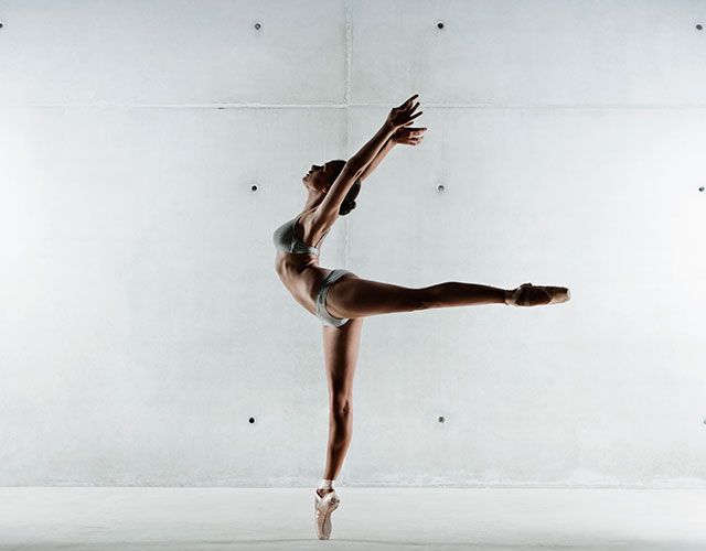 Brown, Human leg, Knee, Athletic dance move, Calf, Dancer, Back, Waist, Balance, Performance art, 