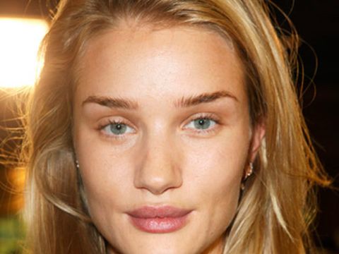 <p><strong>The makeup look:</strong> <em>No</em> makeup! "Raw, natural beauty" according to Makeup Artist Tom Pecheux. The natural look (as sported on Rosie Huntington-Whiteley), is all about clever skincare.</p>
<p><strong>The products:</strong> All MAC - Prep + Prime Moisture Infusion mixed with Studio Moisture Fix SPF 15, massaged into the face to instantly hydrate, replenish, and revive the skin. Studio Finish SPF 35 Concealer applied only where needed. Fast Response Eye Cream patted and blended into the eye area to soothe and soften skin. Lip Conditioner patted into lips to nourish and lightly moisturise.</p>