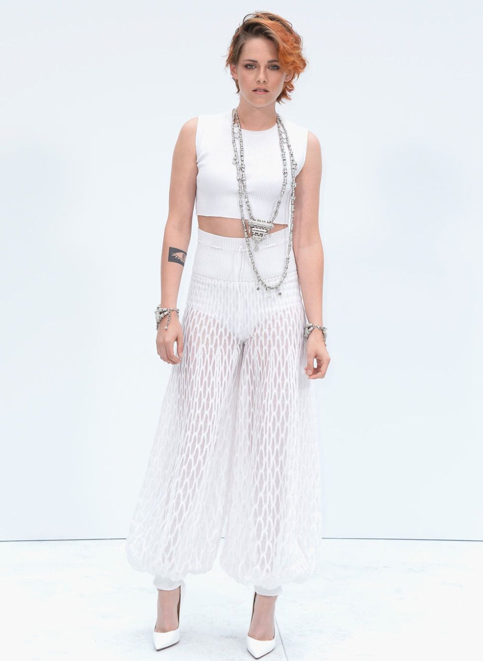 <p>Has Kristen ever looked this cool before? No. Never. Ever.</p>
<p>The Twilight actress not only debuted a brand new crop, but also showed off her fashion prowess in an all-white Chanel ensemble.</p>
<p>K-Stew's ribbed white crop top and sheer trousers made her look every inch a star, with her quirky crop and Chanel jewellery completing the look.</p>
<p><a href="http://www.cosmopolitan.co.uk/fashion/celebrity/celebrity-style-gallery">THIS WEEK'S BEST CELEBRITY STYLE</a></p>
<p><a href="http://www.cosmopolitan.co.uk/fashion/news/paris-fashion-week-versace" target="_blank">J.LO STUNS IN SILVER AT VERSACE</a></p>
<p><a href="http://www.cosmopolitan.co.uk/fashion/shopping/celebrity-weddings-1" target="_blank">AMAZING ALTERNATIVE CELEBRITY BRIDAL LOOKS</a></p>
