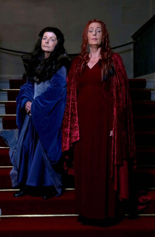Costume, Costume design, Long hair, Fictional character, Acting, Stairs, One-piece garment, Red hair, Boot, Drama, 