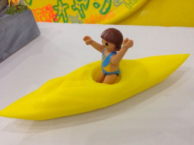 Yellow, Toy, Fictional character, Surfboard, Surfing Equipment, Banana family, Fruit, Action figure, Animation, Figurine, 