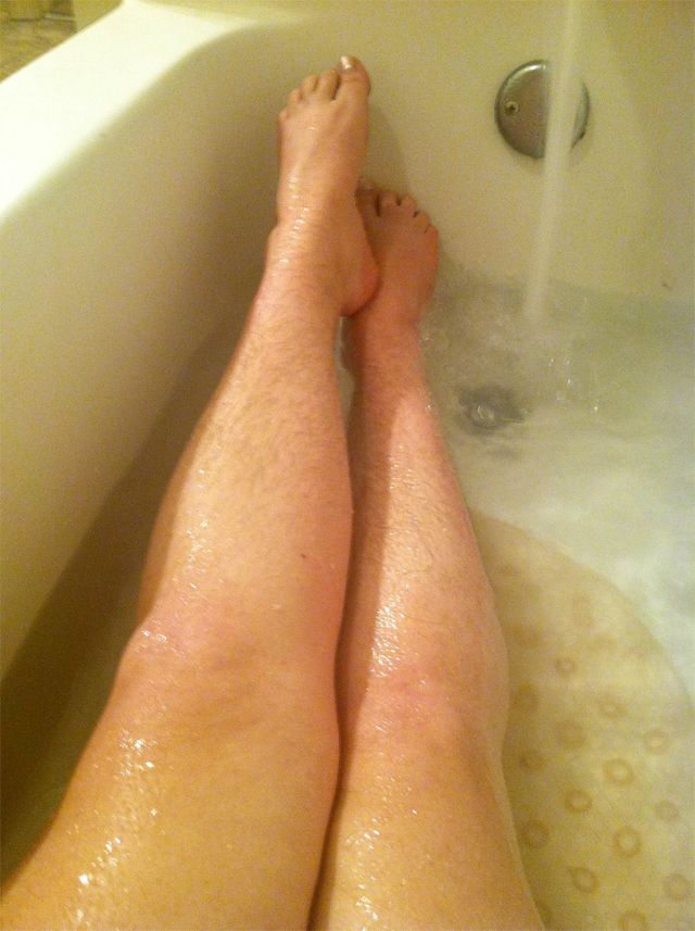 Fluid, Skin, Human leg, Toe, Joint, Bathtub, Foot, Plumbing, Bathroom, Black, 