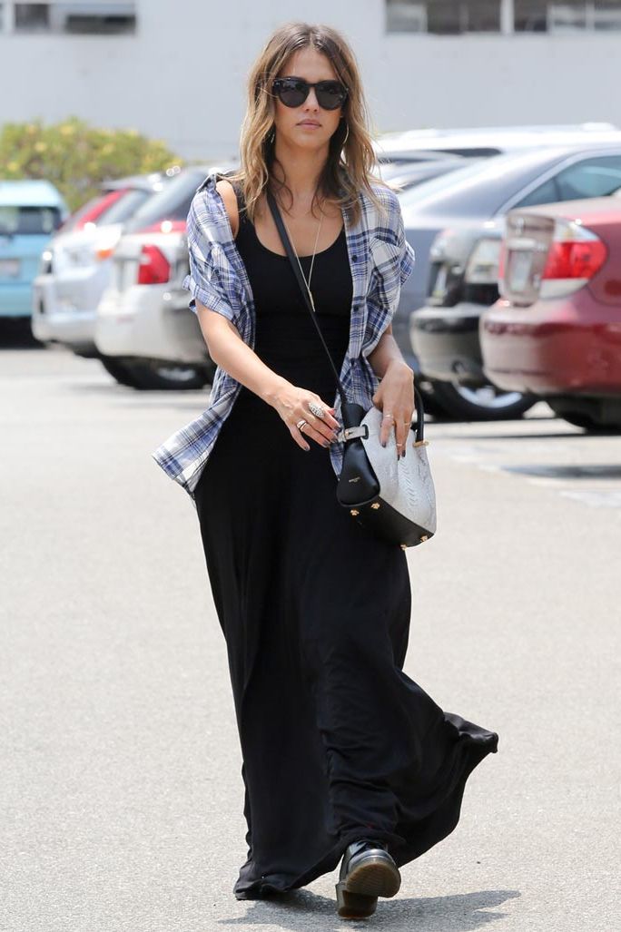 <p>Throw a short-sleeved, lightweight check shirt over a plain maxi dress to add some attitude to your daytime casual look.</p>