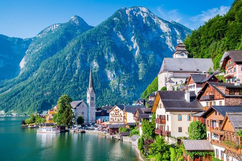 Village on lake with mountains in Austria