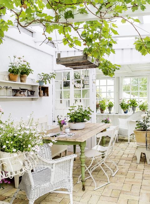 table, furniture, chair, outdoor table, flowerpot, outdoor furniture, patio, houseplant, flower arranging, outdoor structure,