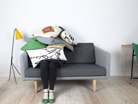 woman sofa pillows