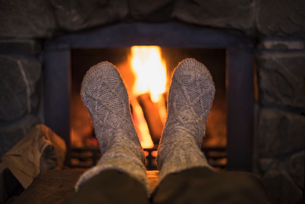 Woolly socks by fire