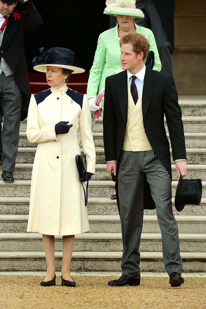 Princess Anne with Prince Harry at a garden party in 2014