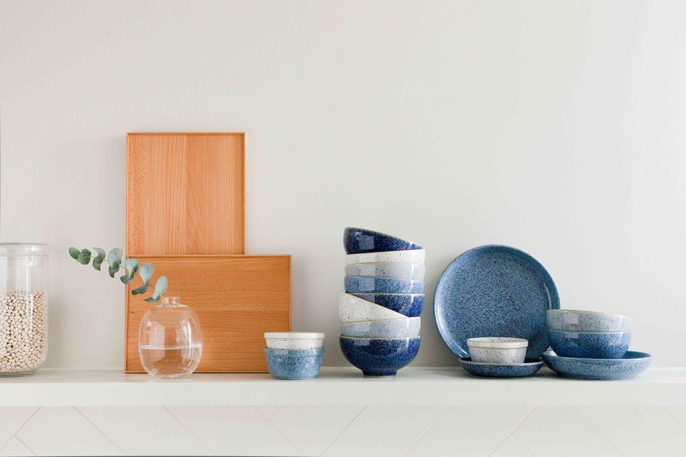 <p>Blue hues can help a complex and busy world feel simpler as this colour ignites a sense of calm. Pair blue ceramics with warm woods and natural linen for a palette that is both effortless and classic. Stacks of Studio Blue bowls and plates, in four natural tones, are both calming and pleasing on the eye.</p><p><strong data-redactor-tag="strong">Pictured: <em data-redactor-tag="em">Denby Studio Blue Tableware, £18 - £50, John Lewis</em> <a href="https://www.johnlewis.com/denby-studio-blue-tableware/p89051431" class="body-btn-link" target="_blank">BUY NOW</a></strong><br></p>