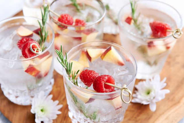 Gin and tonic with apple and raspberry