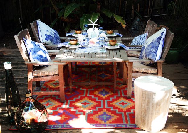 Table, Majorelle blue, Laptop, Outdoor furniture, Tablecloth, Personal computer, Computer, Houseplant, Home accessories, Linens, 