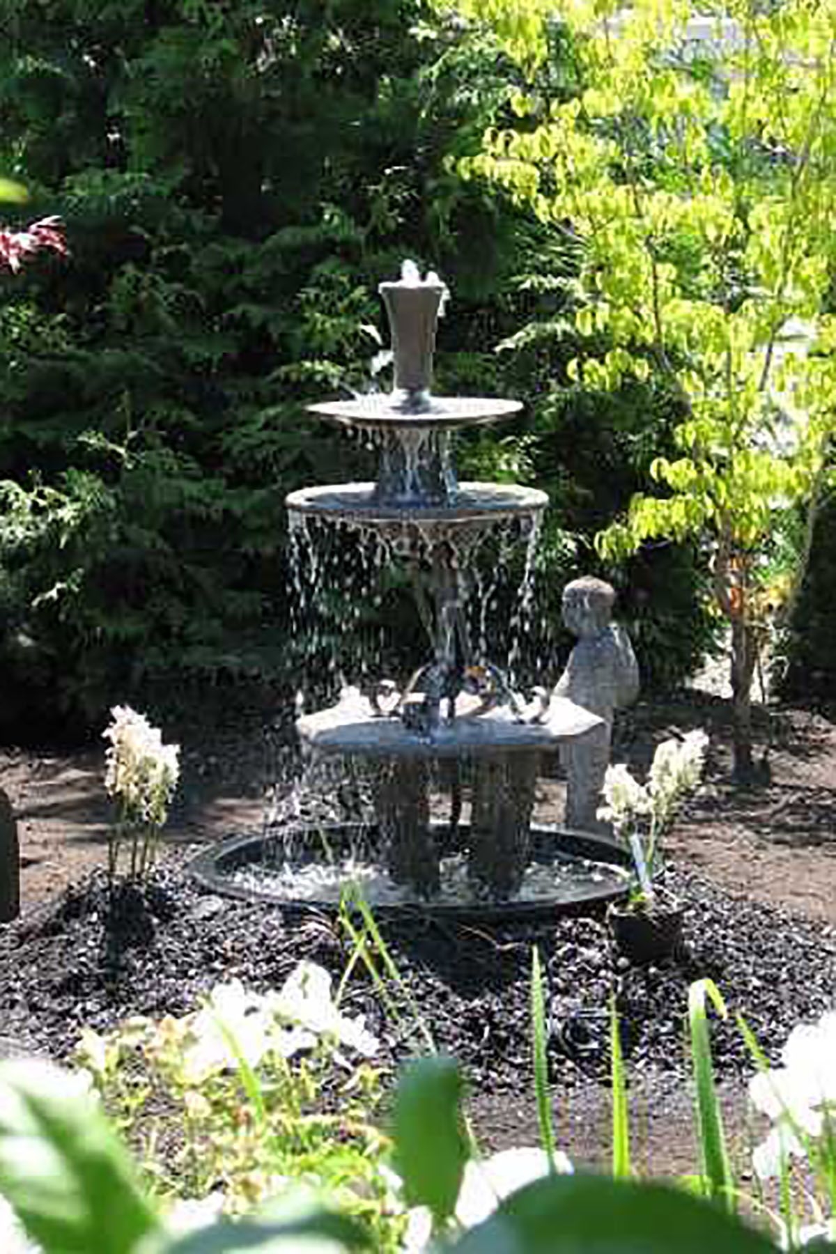 17 outdoor fountain ideas - how to make a garden fountain for your