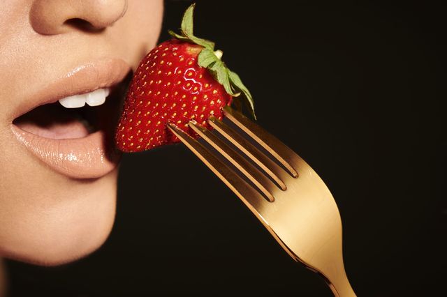 Lip, Strawberry, Fruit, Strawberries, Natural foods, Produce, Tooth, Earrings, Tongue, Accessory fruit, 