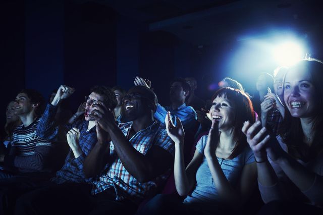 Fun, Social group, Crowd, Darkness, Cheering, Flash photography, Concert, Celebrating, Lens flare, Music venue, 