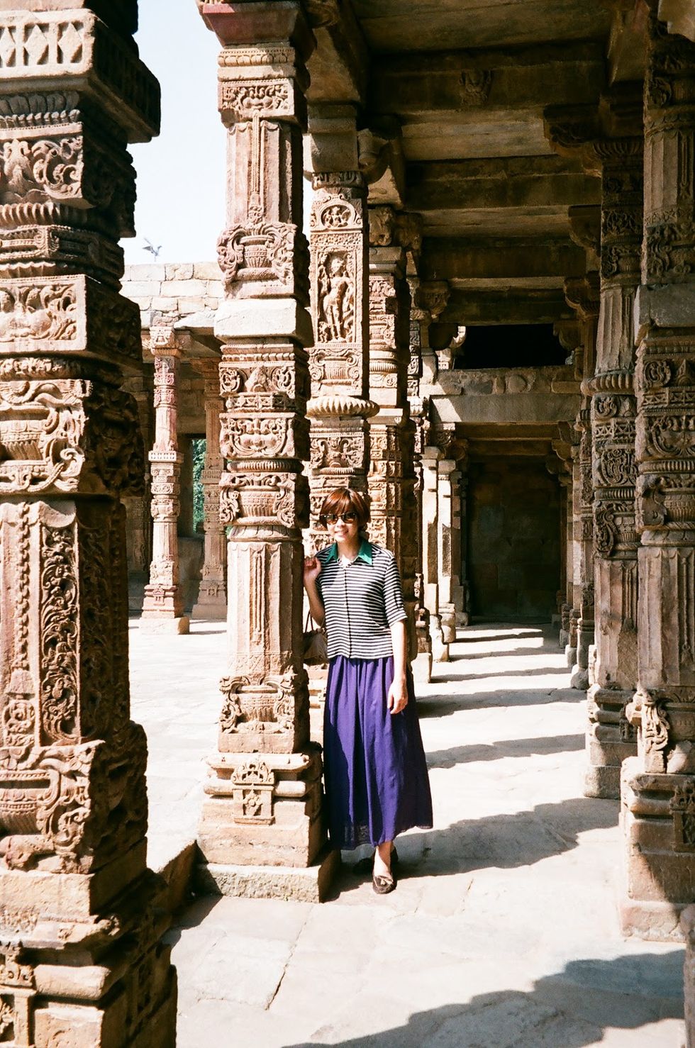 Standing, Ancient history, History, Temple, Travel, Street fashion, Column, Archaeological site, Ruins, Historic site, 
