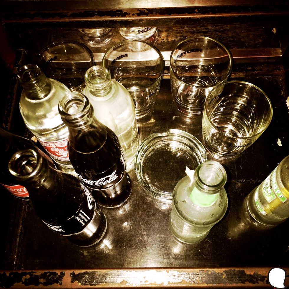 Bottle, Glass, Glass bottle, Drinkware, Drink, Still life photography, Home accessories, Bottle cap, Distilled beverage, Alcohol, 