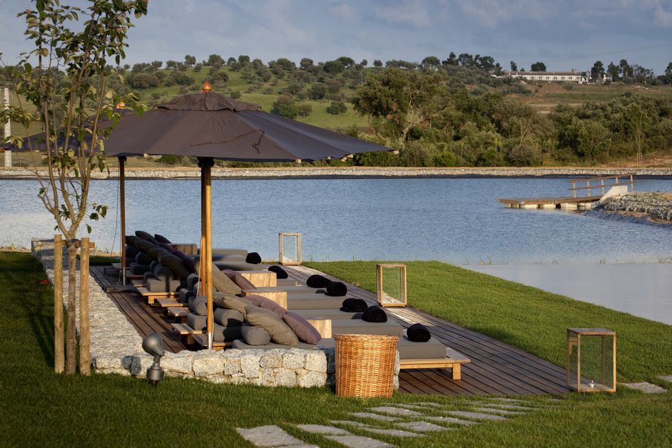 Water, Landscape, Outdoor furniture, Resort, Bank, Reservoir, Sunlounger, Shade, Shore, Lake, 