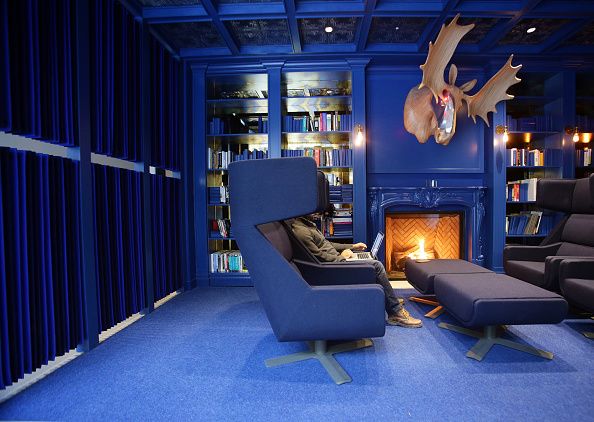 Blue, Floor, Interior design, Room, Flooring, Furniture, Majorelle blue, Living room, Couch, Shelf, 