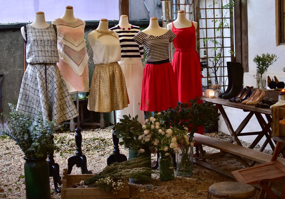 Flowerpot, Mannequin, Dress, Houseplant, One-piece garment, Retail, Fashion design, Day dress, Boutique, 