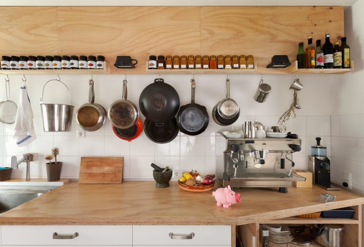 Room, Kitchen, Cabinetry, Pot rack, Kitchen utensil, Home appliance, Drawer, Countertop, Bottle, Major appliance, 