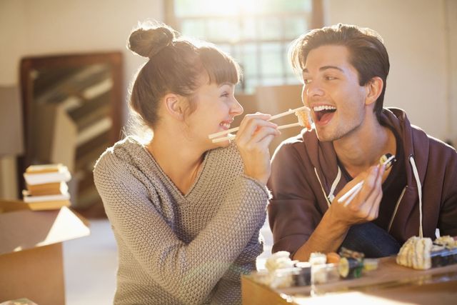 Ear, Table, Tableware, Sharing, Sweater, Eating, Conversation, Plate, Tooth, Comfort food, 