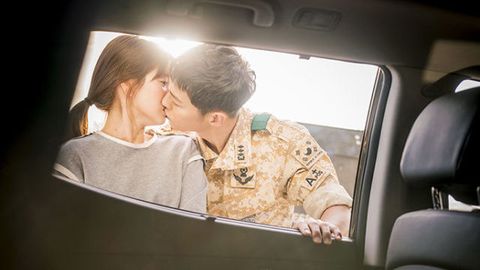 Ear, Interaction, Vehicle door, Love, Romance, Automotive window part, Gesture, Car seat, Head restraint, Military person, 