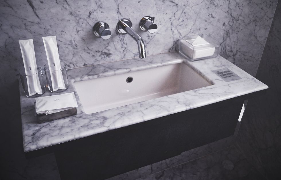 Plumbing fixture, Bathroom sink, Tap, Sink, Fluid, Bathroom accessory, Glass, Plumbing, Bathroom, Composite material, 