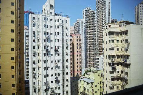 Tower block, Blue, Daytime, Architecture, Urban area, Facade, City, Condominium, Infrastructure, Neighbourhood, 