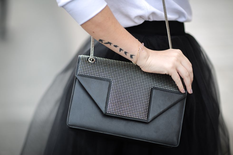 Style, Bag, Fashion, Shoulder bag, Wrist, Material property, Design, Leather, Cuff, Nail, 