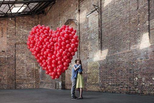 Infrastructure, Architecture, Red, Wall, Balloon, Brick, Party supply, Street fashion, Snapshot, Brickwork, 