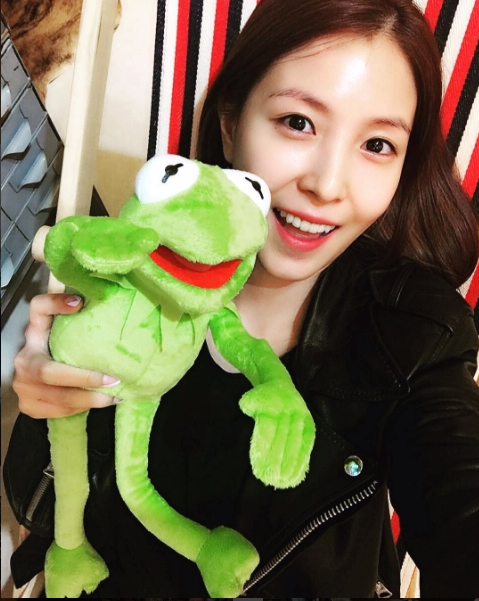Smile, Green, Toy, Plush, Stuffed toy, Happy, Facial expression, Flag, Amphibian, Tooth, 