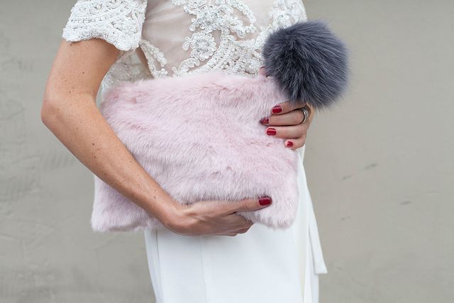 Sleeve, Shoulder, Textile, Pink, Fashion, Natural material, Fur, Waist, Costume accessory, Animal product, 