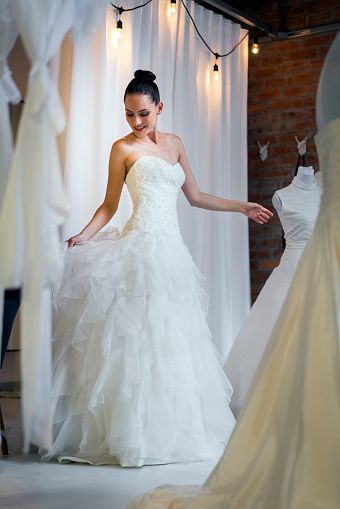 Clothing, Bridal clothing, Shoulder, Textile, Photograph, Gown, Joint, White, Wedding dress, Dress, 