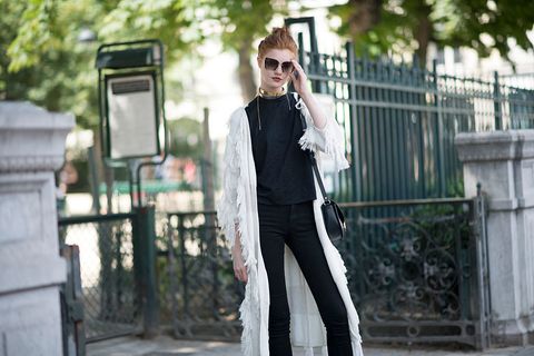 Sunglasses, Outerwear, Style, Goggles, Street fashion, Bag, Waist, Fence, Top, Active pants, 