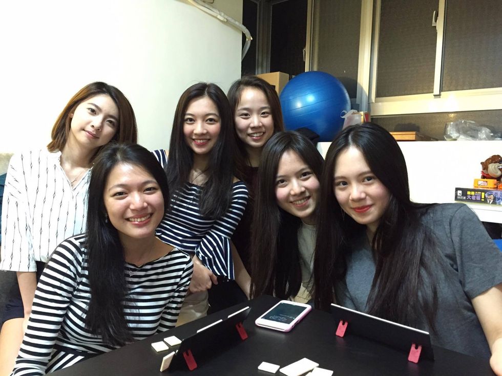 Smile, Social group, Balloon, Happy, Facial expression, Friendship, Youth, Gadget, Party supply, Long hair, 