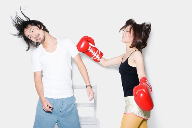 Nose, Boxing glove, Boxing equipment, Human body, Boxing, Jeans, Denim, Elbow, Red, Professional boxer, 